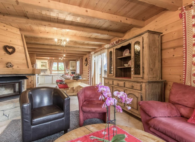 Chalet l'Edelweiss, Living room with fireplace and baby foot, Châtel 74390