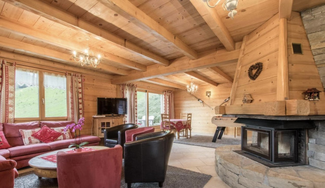 Chalet l'Edelweiss, Living room with fireplace and baby foot, Châtel Mountain 74