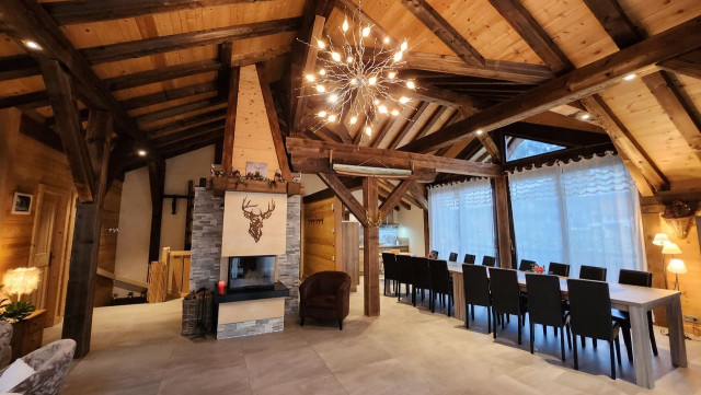 Chalet Roche Alpine, Living room with fireplace, Family holidays